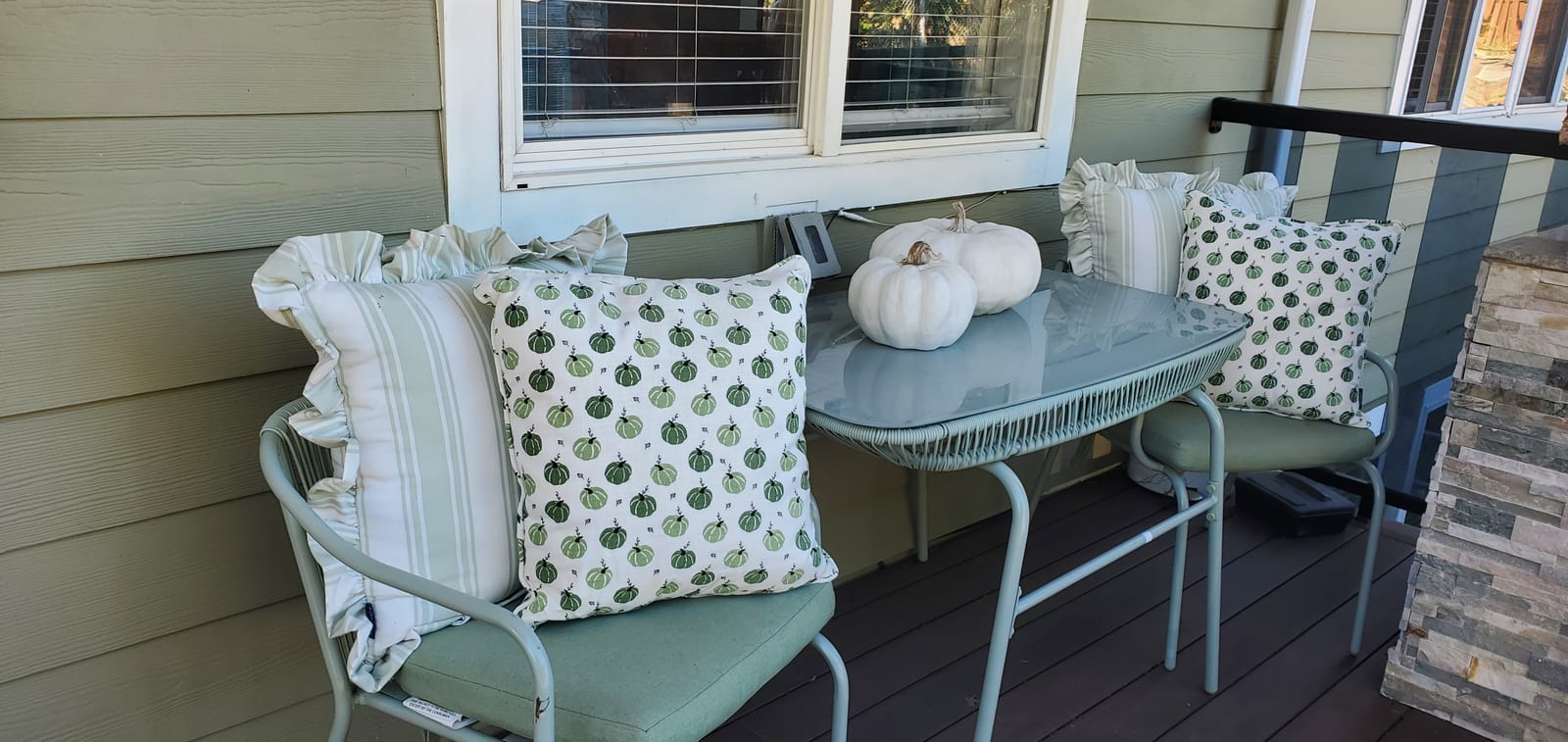 Front porch seating with cushioned chairs