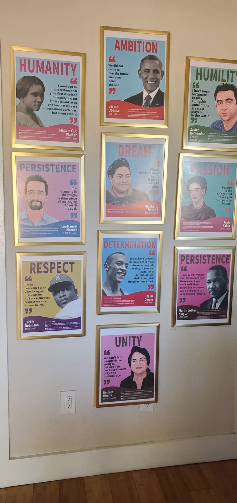 A wall of inspirational posters inside the home
