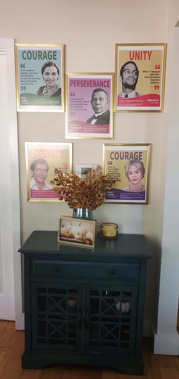 Inspirational posters above a cabinet