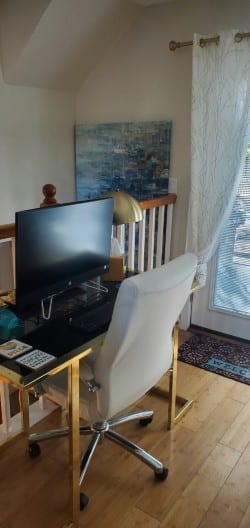 Home office nook with computer and chair